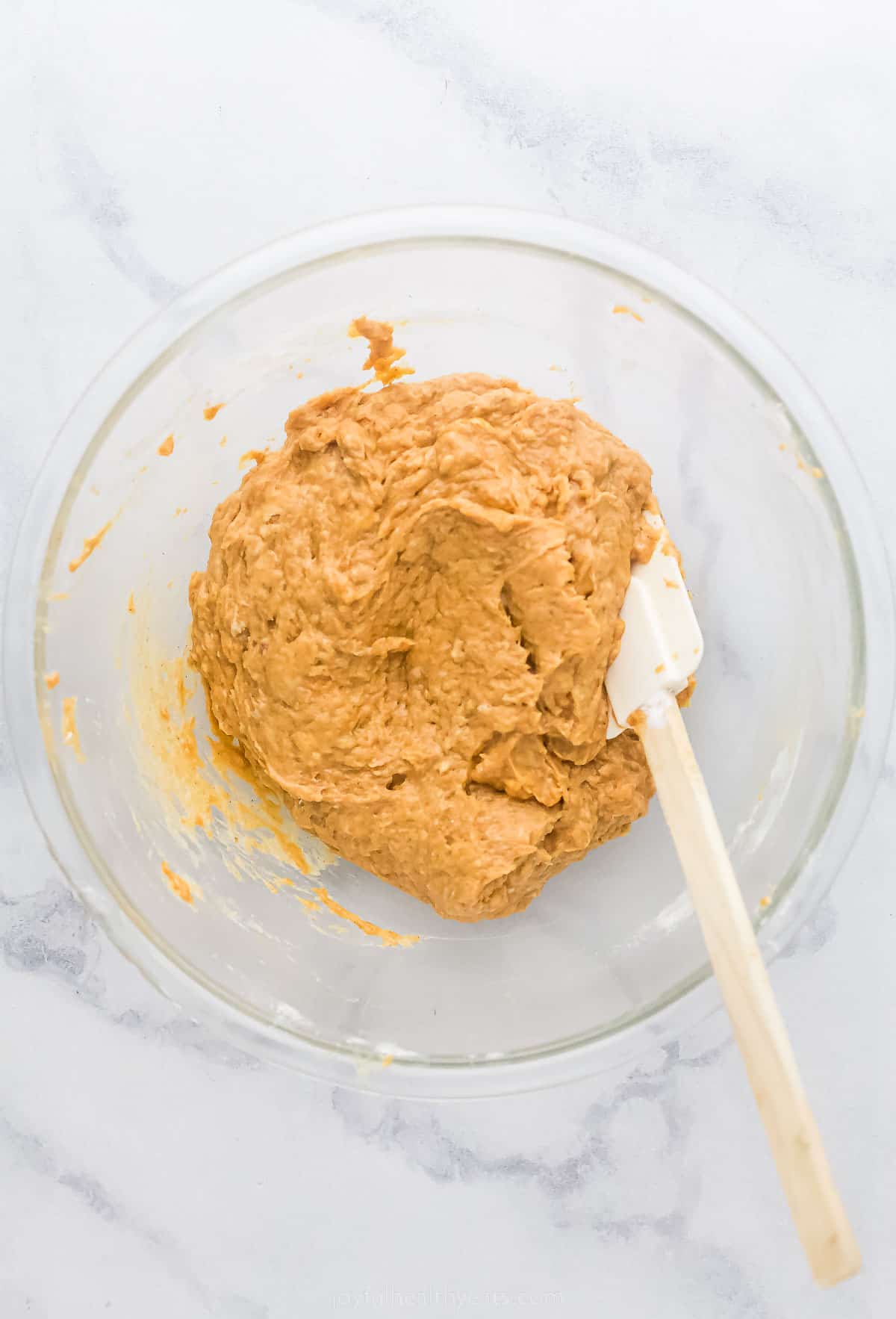 pumpkin muffin batter in a bowl