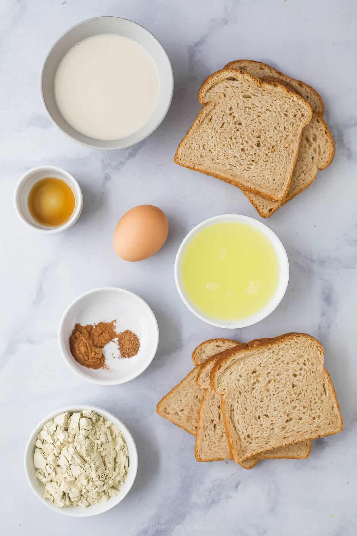 ingredients to make protein french toast like bread, egg, egg whites, cinnamon, oat milk, and protein powder