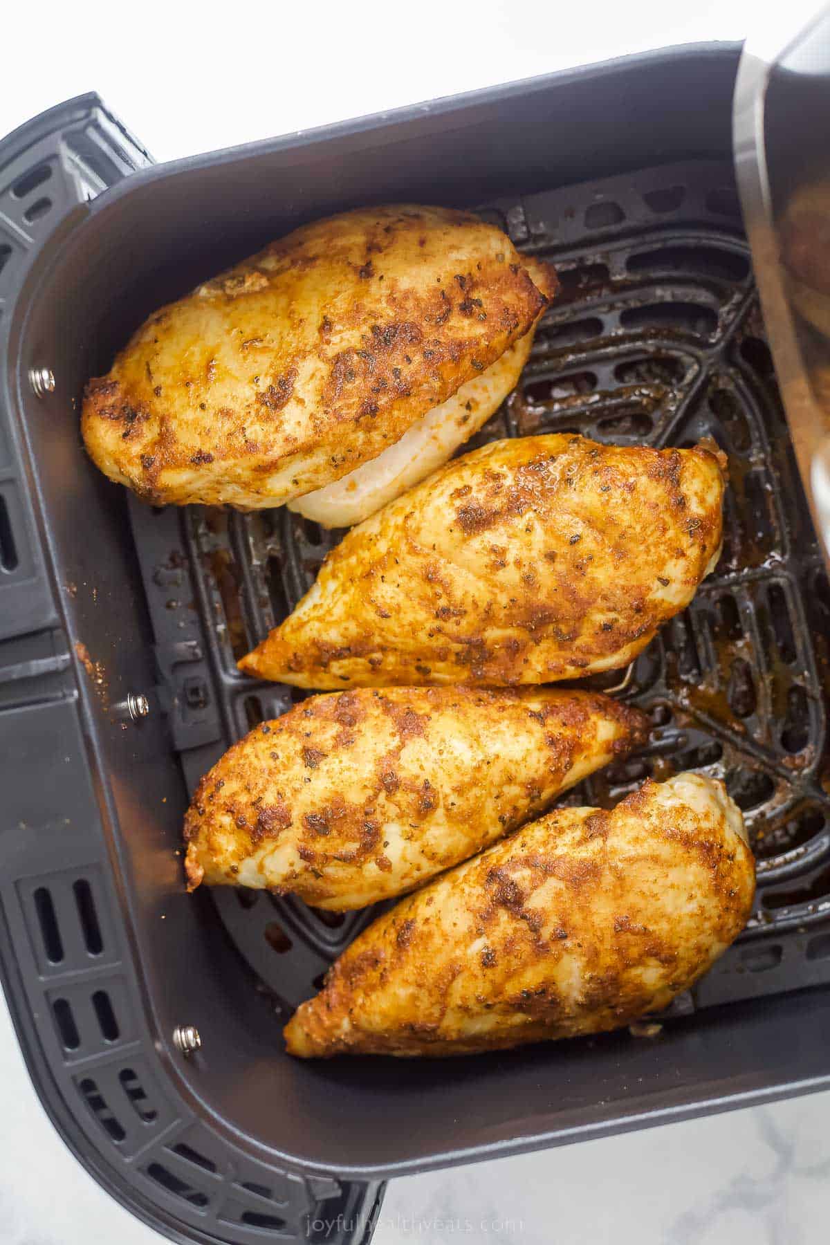 air fryer chicken breasts in the air fryer tray