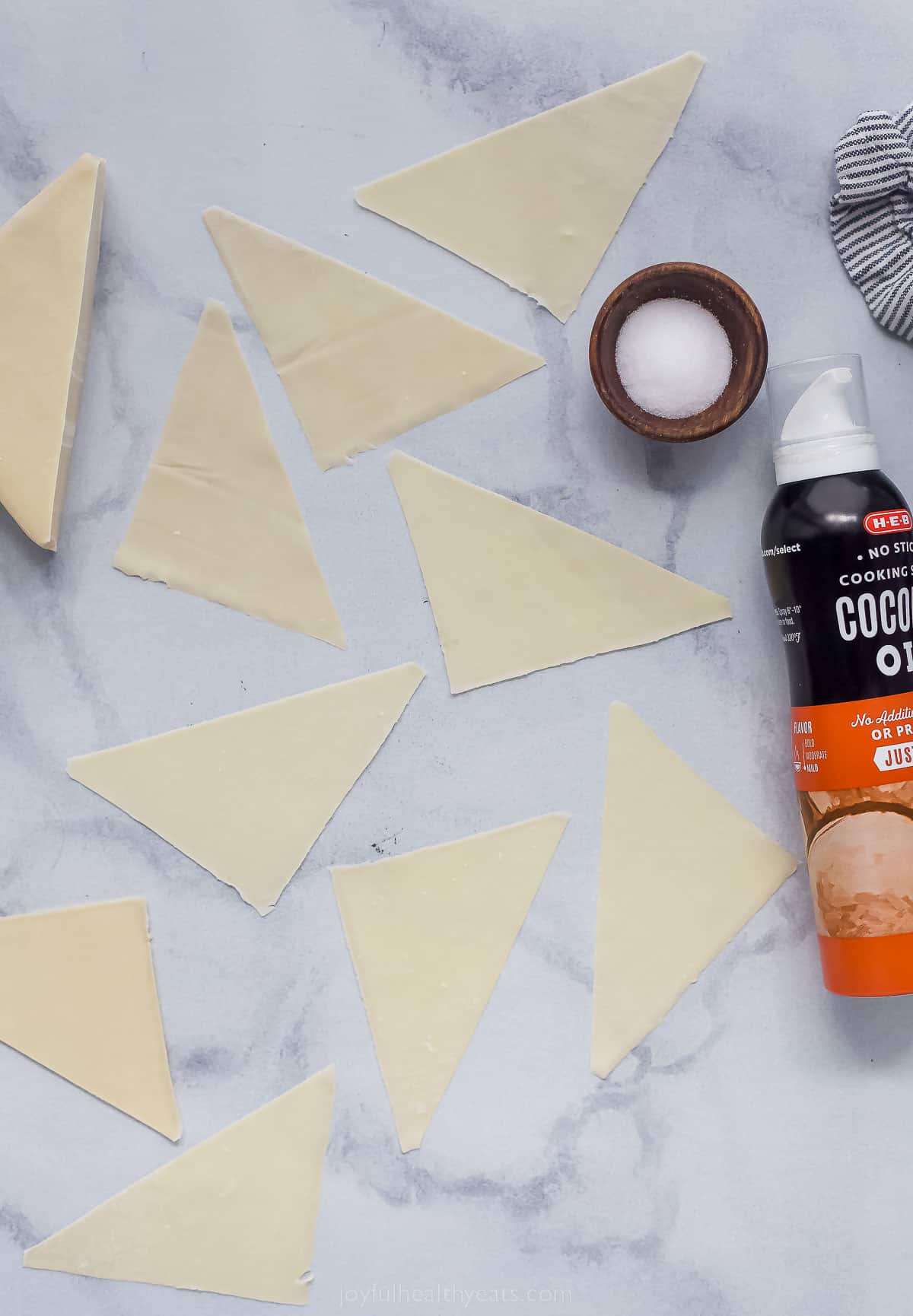 wontop triangles on a countertop with coconut oil spray