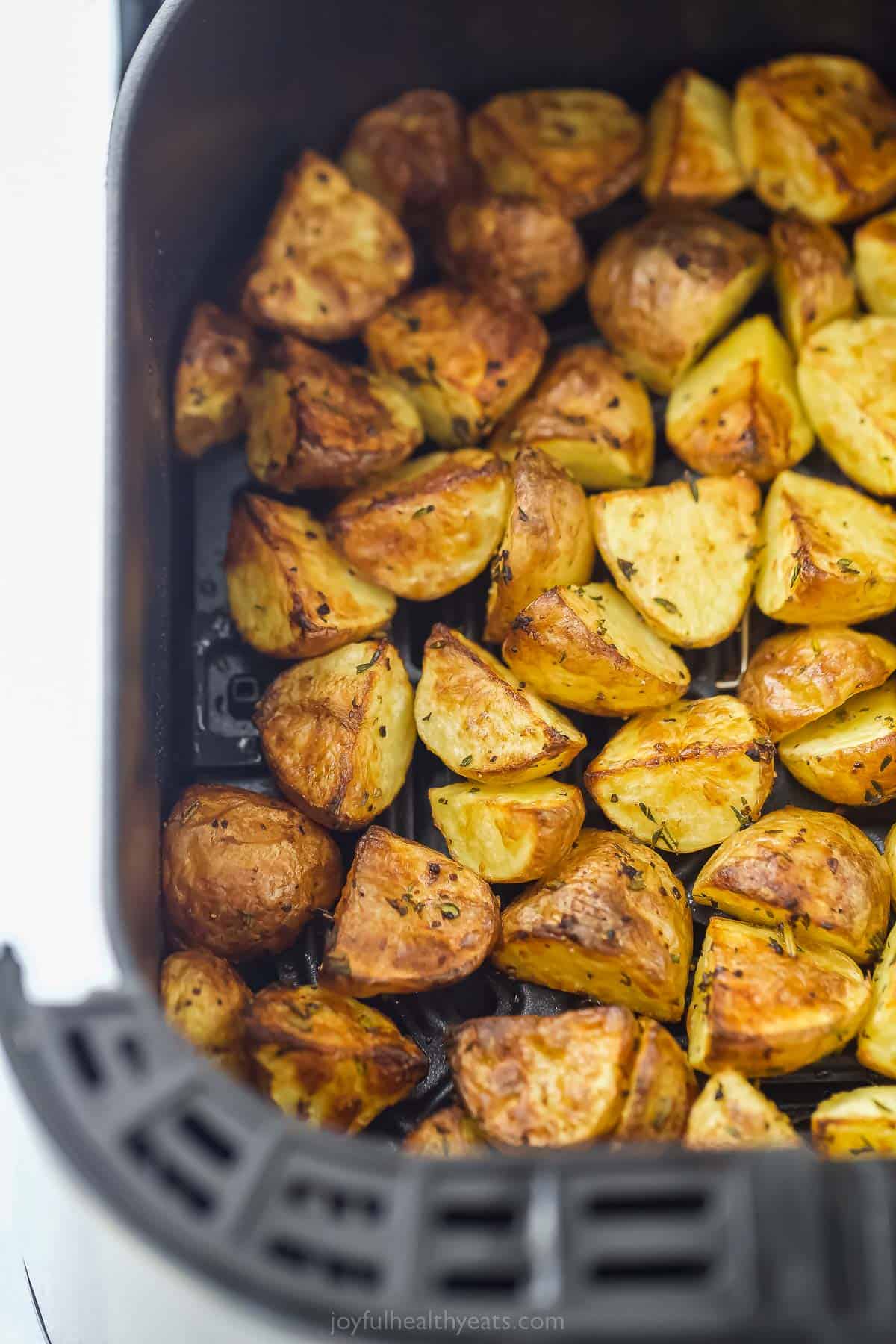These are the best Air Fryer Roasted Potatoes! Tender on the inside and crispy on the outside. These potatoes are herby and delicious. roasted potatoes in the air fryer