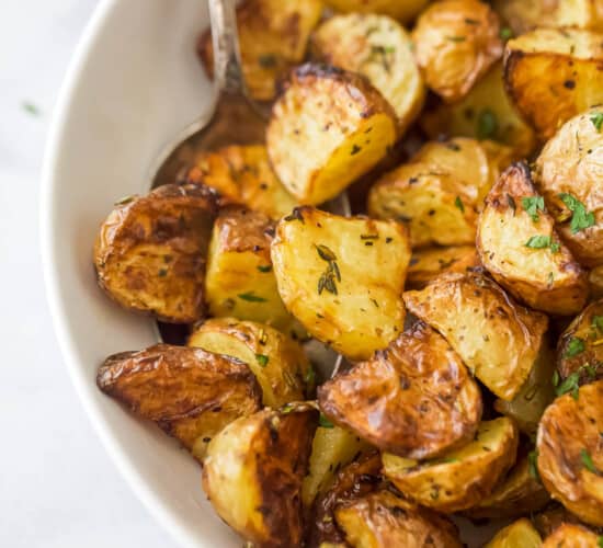 a bowl of air fryer roasted potatoes
