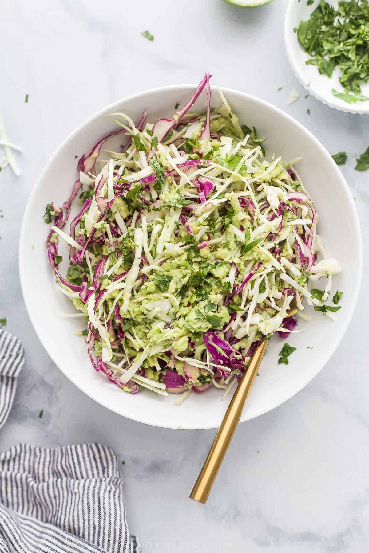 shredded creamy coleslaw for fish tacos in a bowl