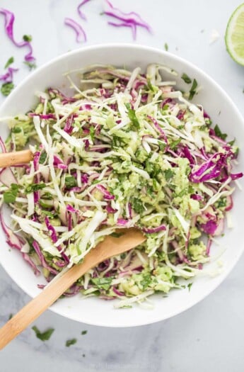 shredded creamy coleslaw for fish tacos in a bowl