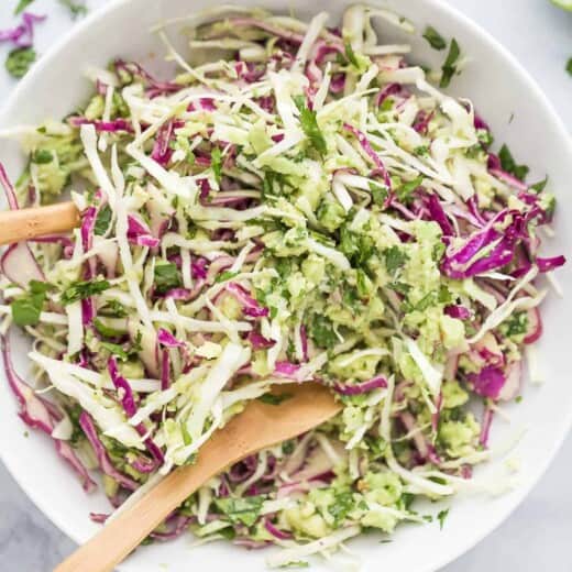 shredded creamy coleslaw for fish tacos in a bowl