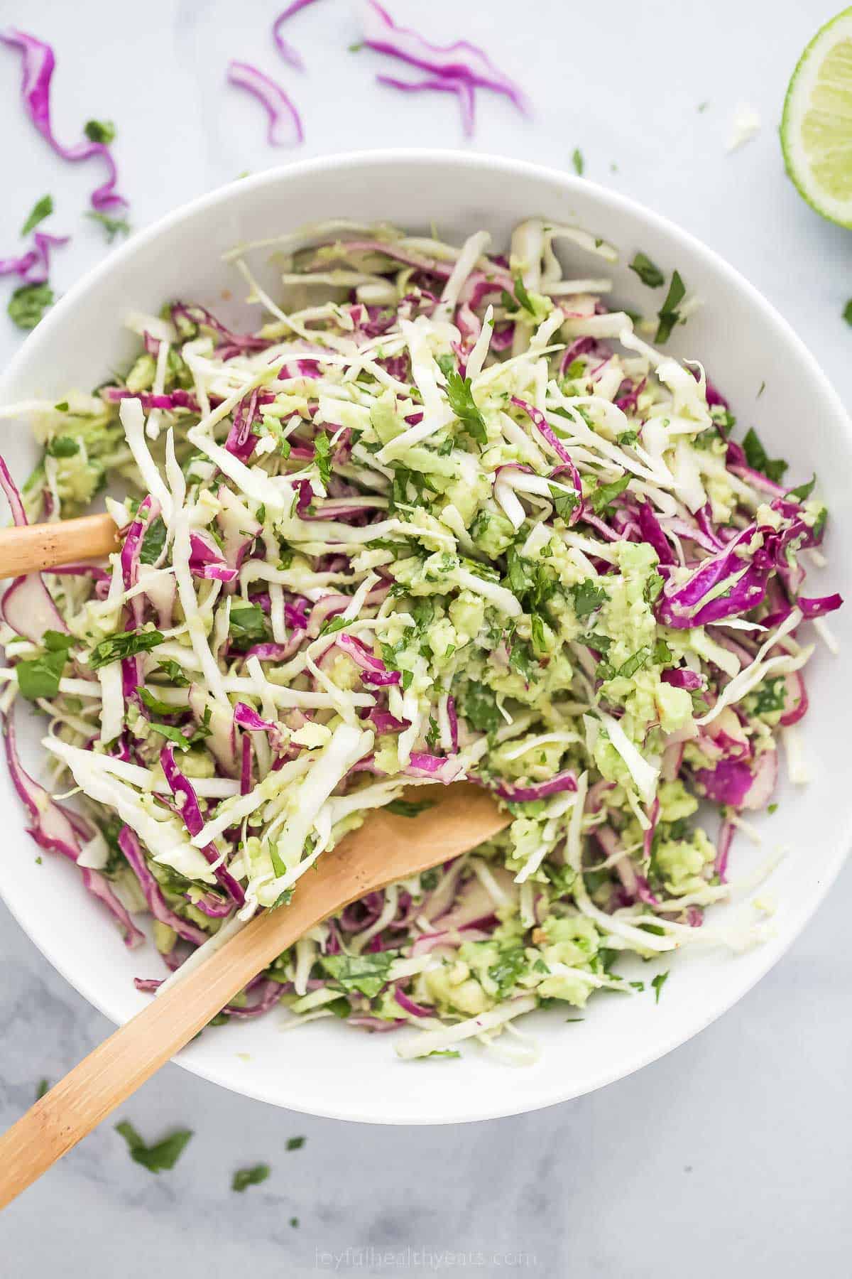 shredded creamy coleslaw for fish tacos in a bowl