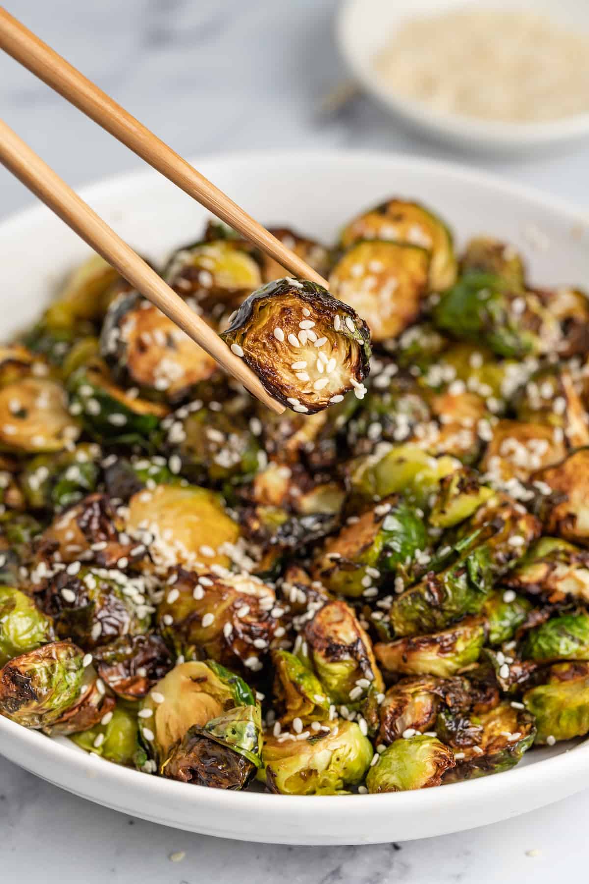 a bowl of crispy fried brussels sprouts