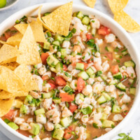 Bowl of camaron ceviche with corn chips.