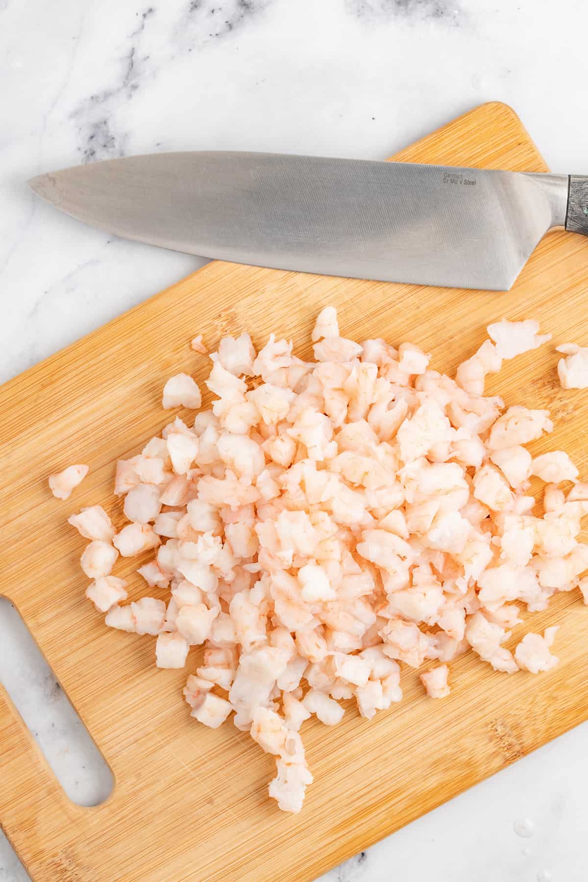 Dicing the shrimp. 