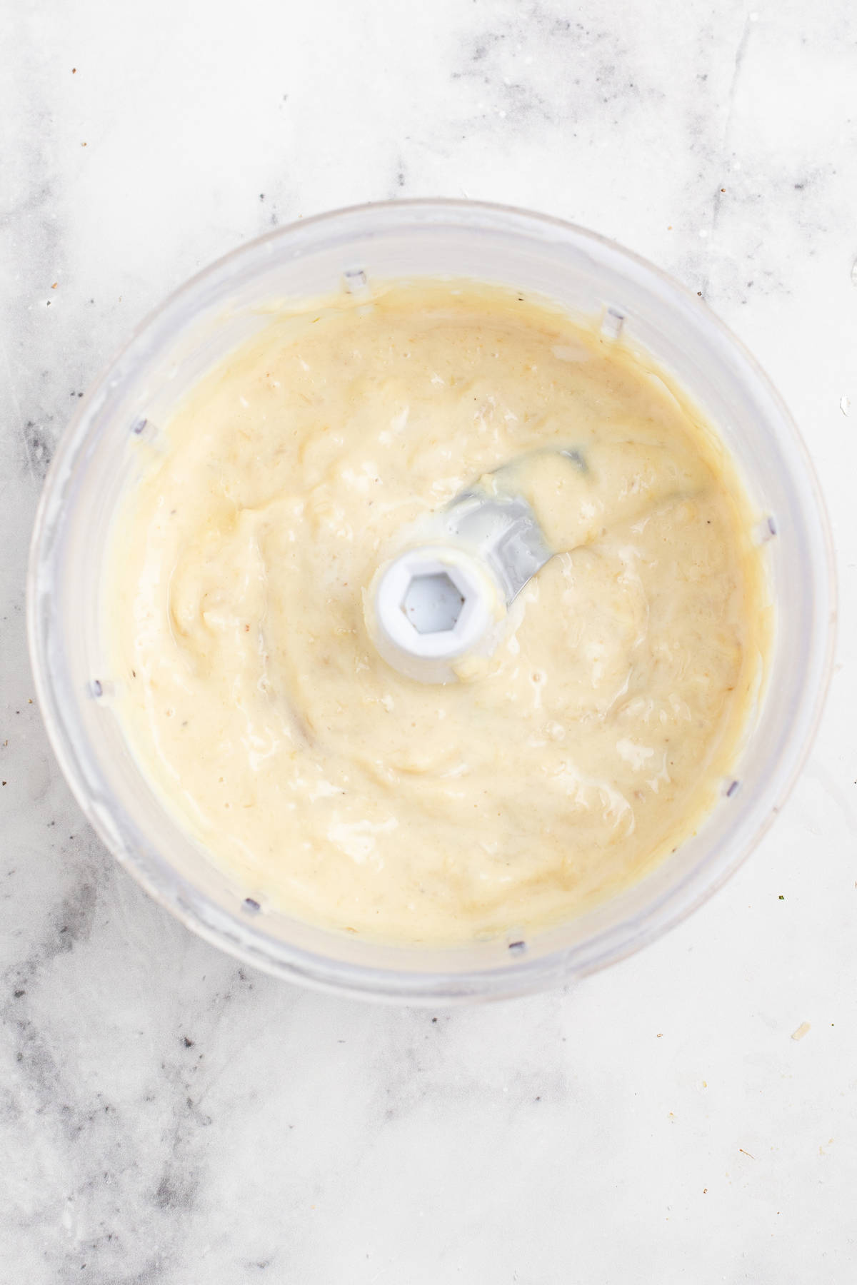 Blended aioli in the food processor. 