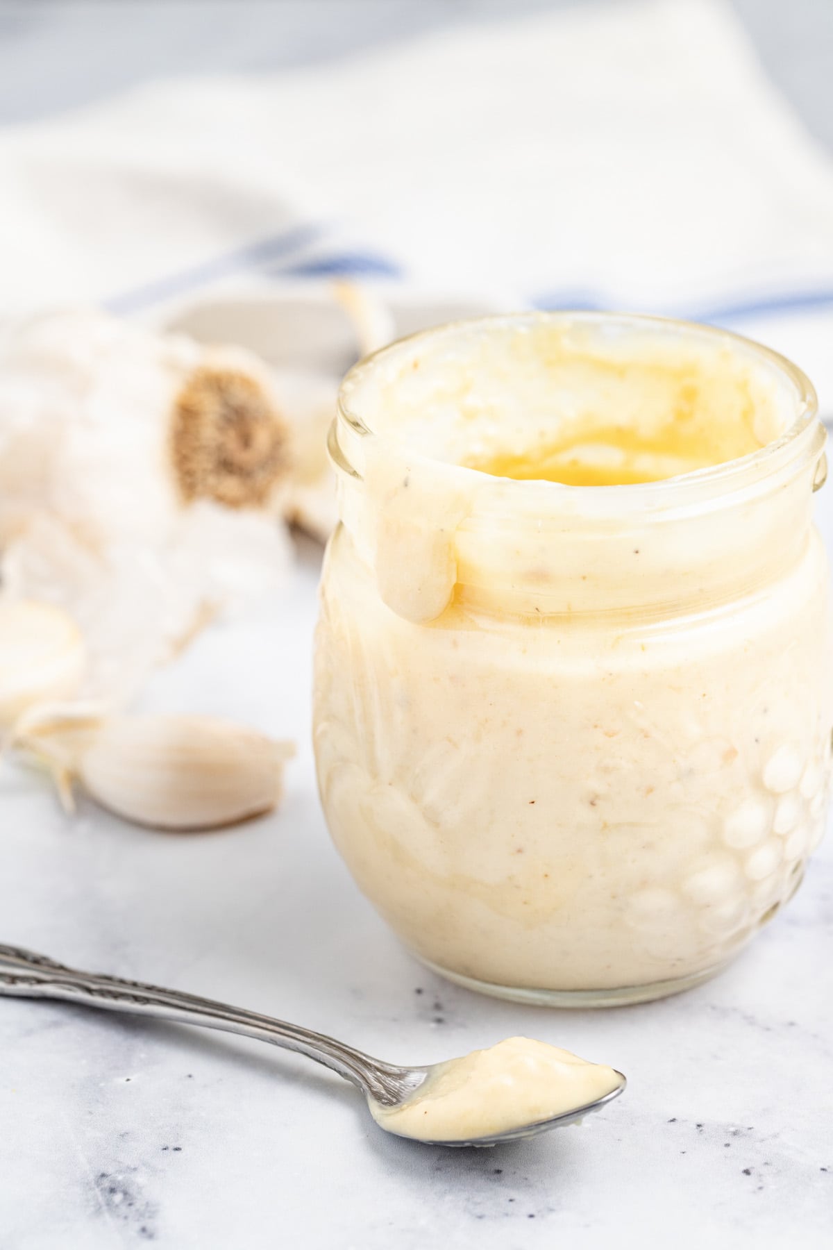 Jar of garlic aioli. 