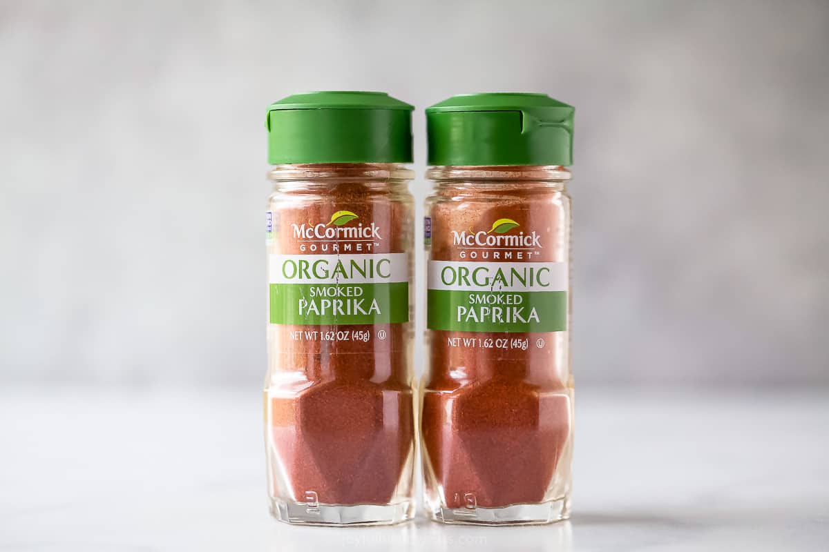 Horizontal photo of smoked paprika in glass jars