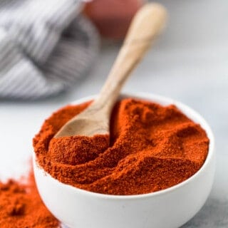 smoked paprika in a bowl with a spoon