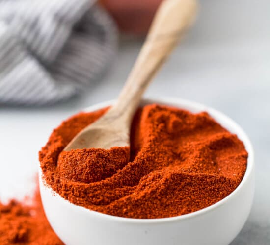 smoked paprika in a bowl with a spoon