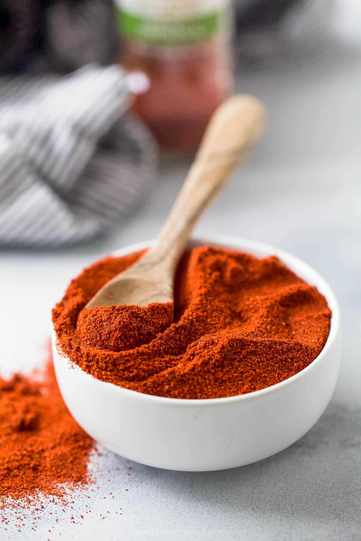 Smoked paprika in a bowl with a spoon