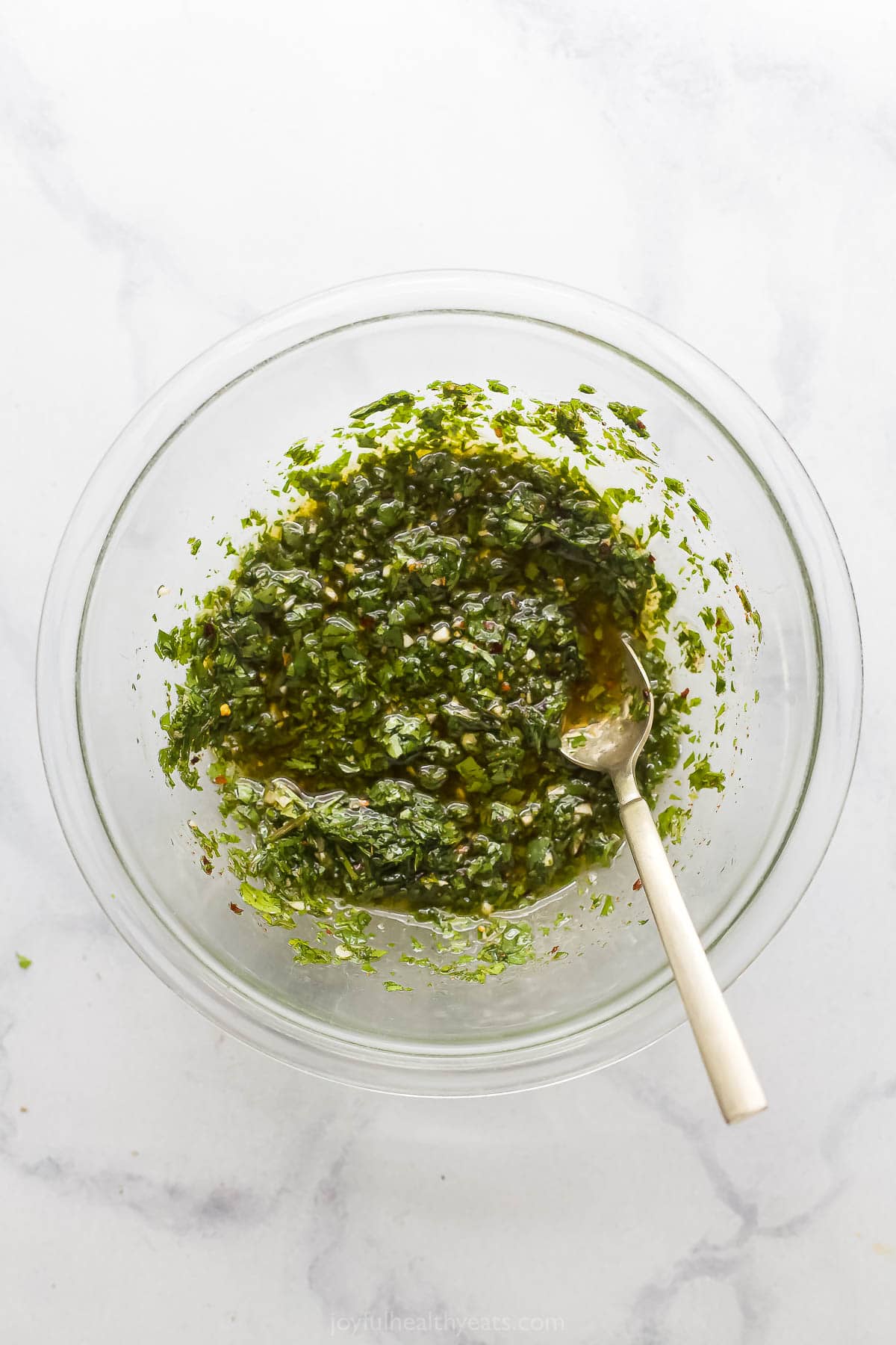 Homemade chimichurri in a bowl. 