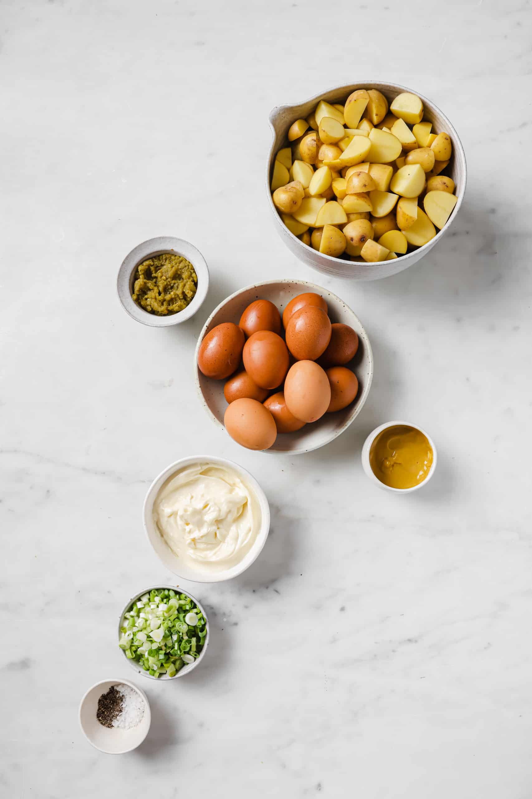 This easy deviled egg potato salad is creamy, tangy, and rich. Served chilled or warm, it'll be your new favorite summer side! Ingredients for egg potato salad.