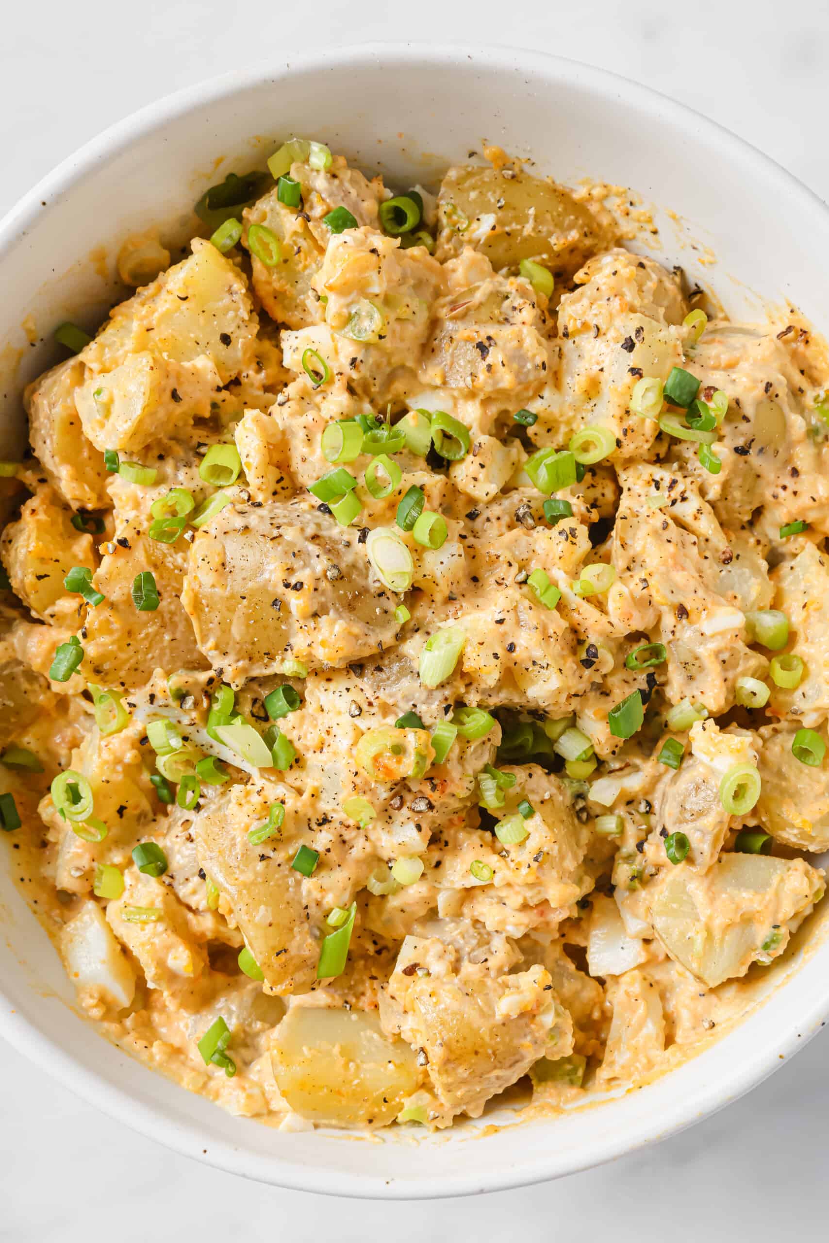 Close-up of deviled egg potato salad. 