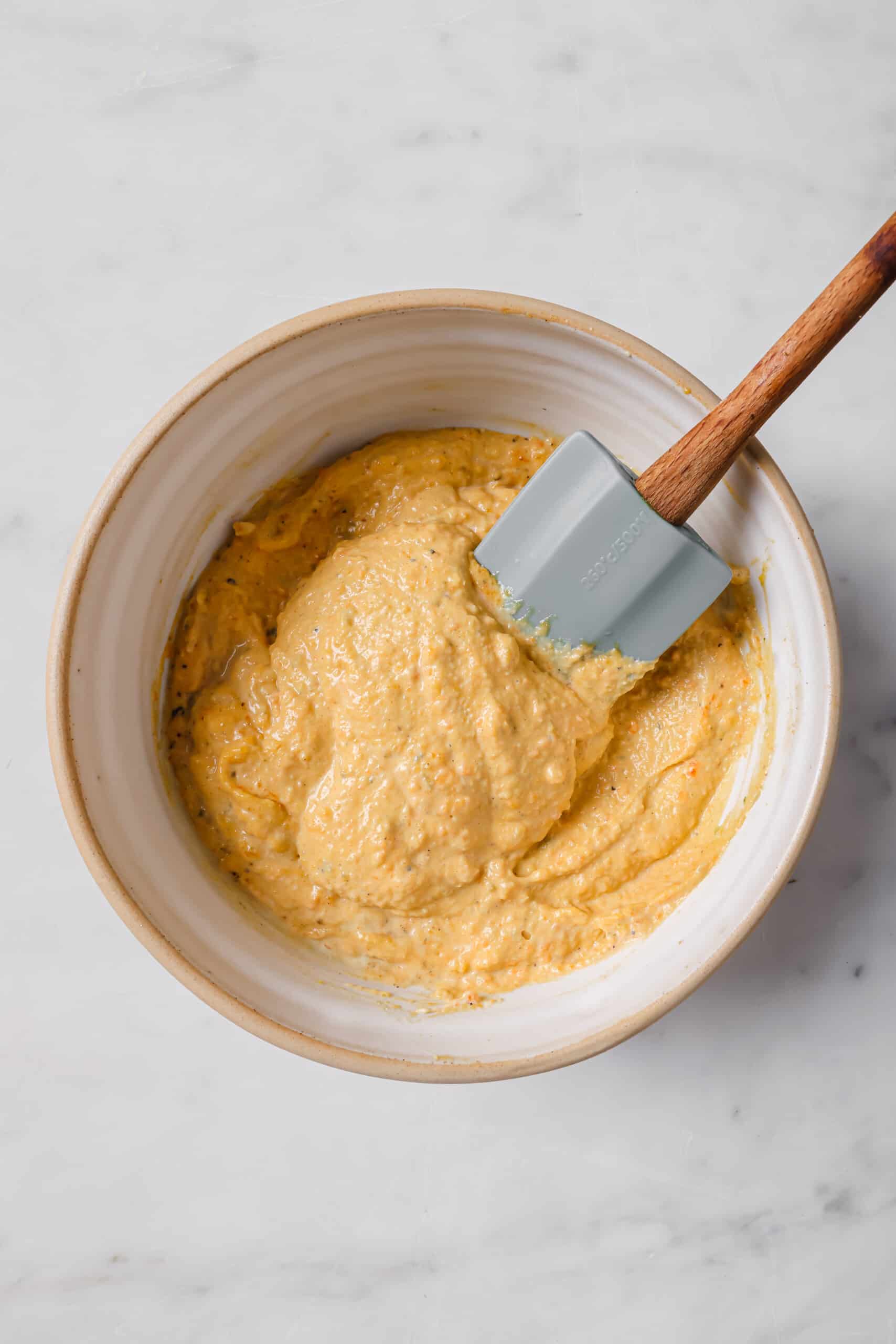 This easy deviled egg potato salad is creamy, tangy, and rich. Served chilled or warm, it'll be your new favorite summer side! Making the sauce.