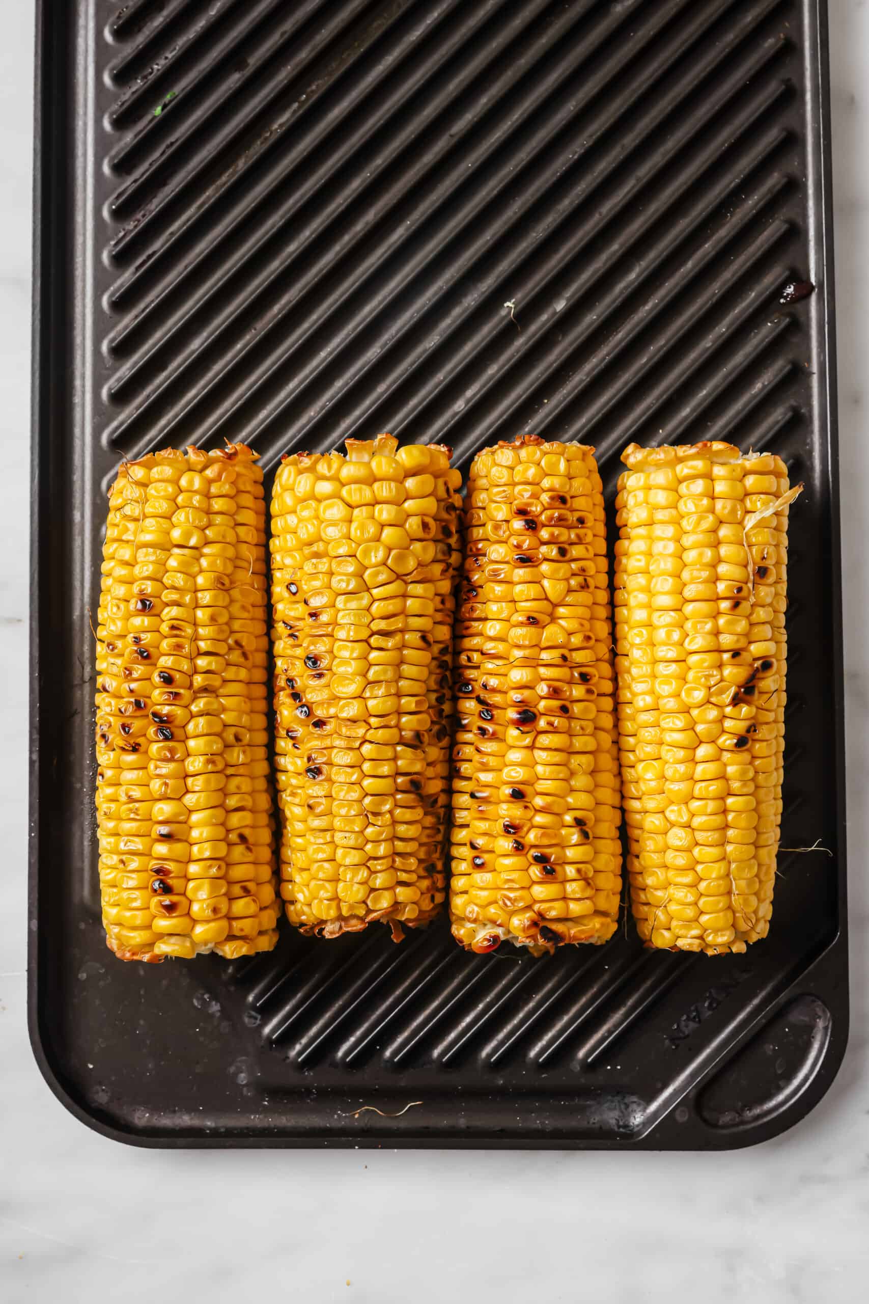 Grilling the corn.