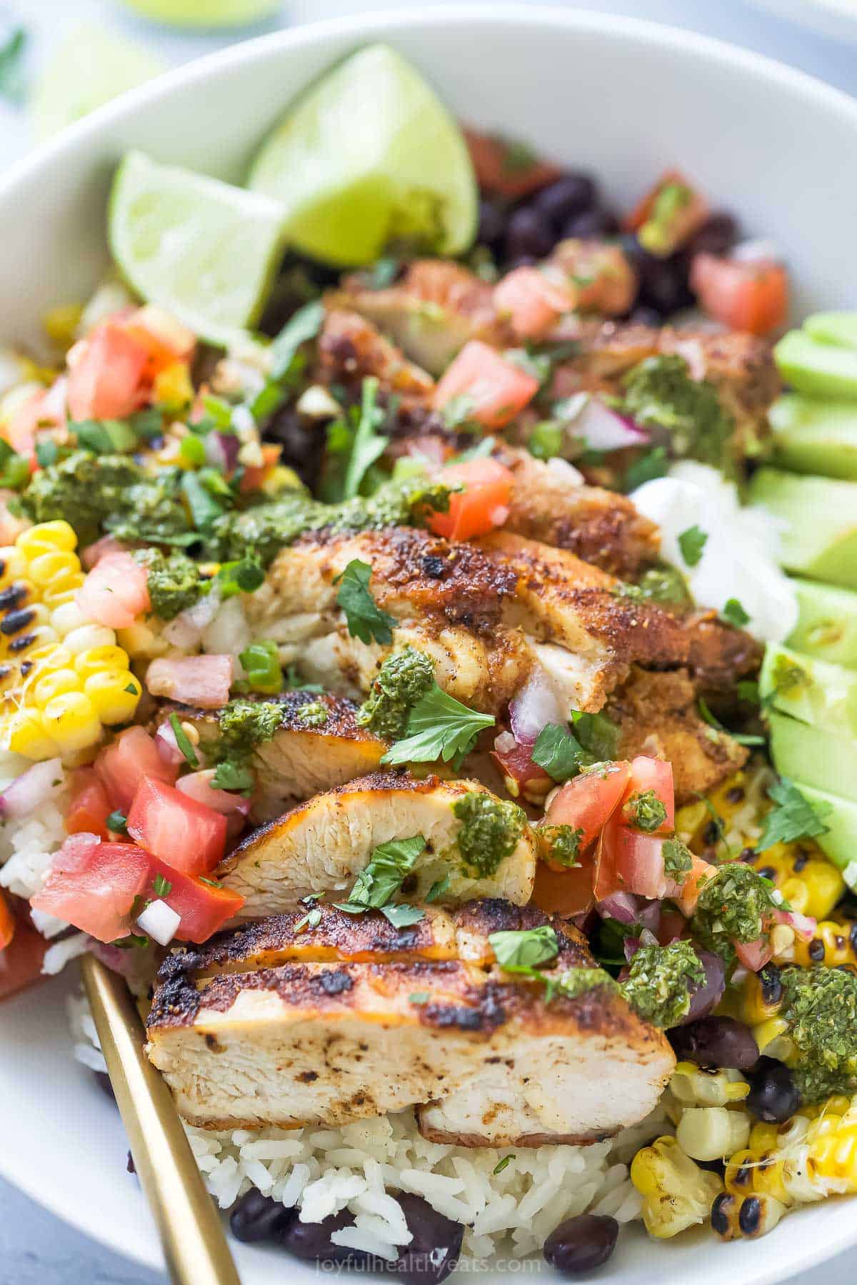 Close-up of a burrito bowl with avocado. 