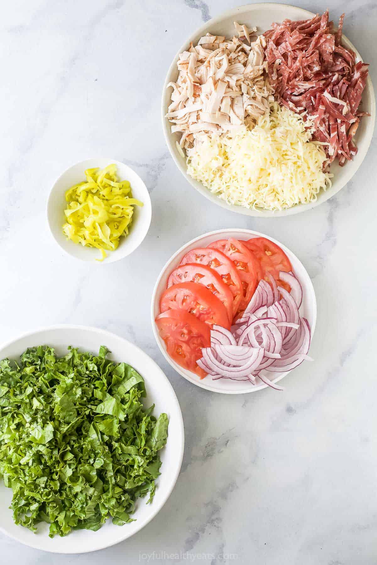 This easy Italian grinder salad recipe with homemade dressing is a trending 15-minute side that'll be a hit at the dinner table. Ingredients for grinder salad recipe.