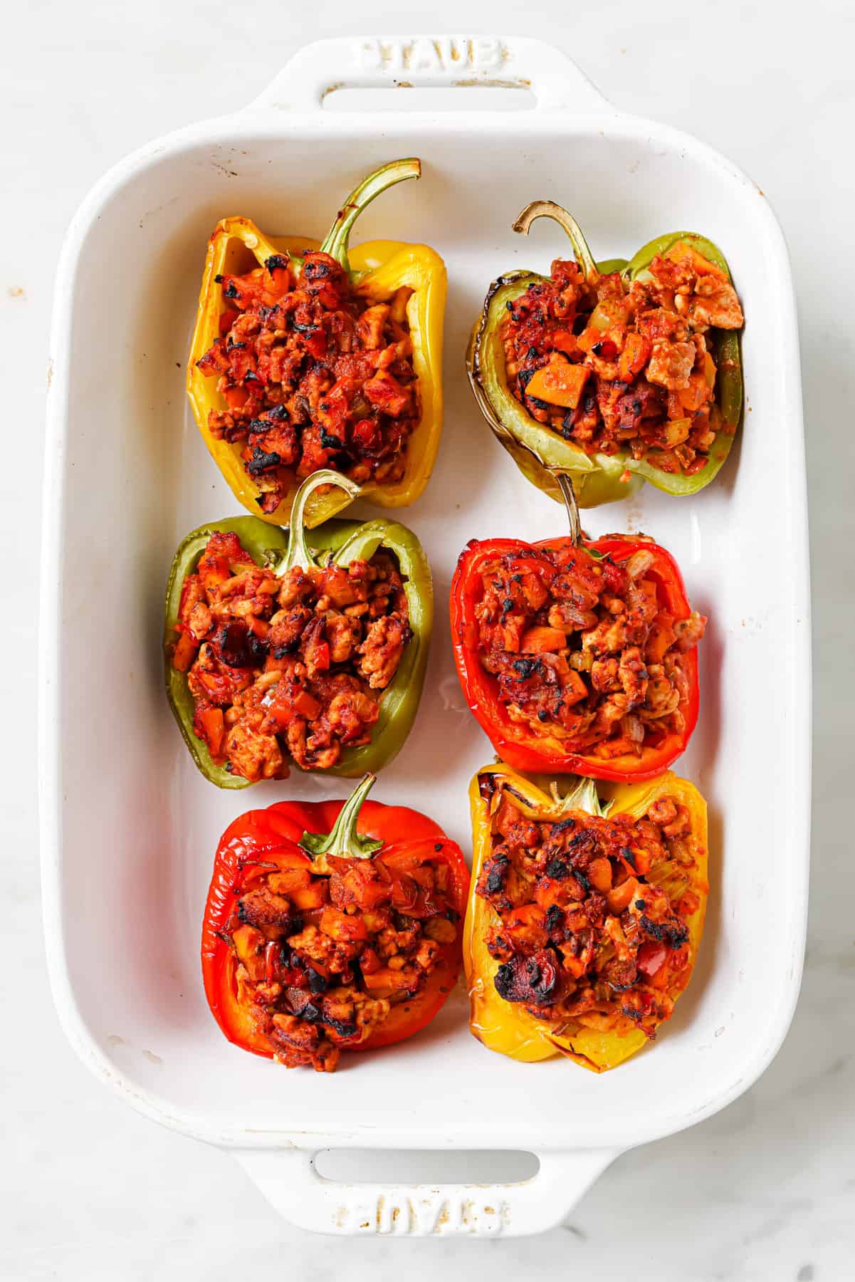 Stuffing the peppers. 
