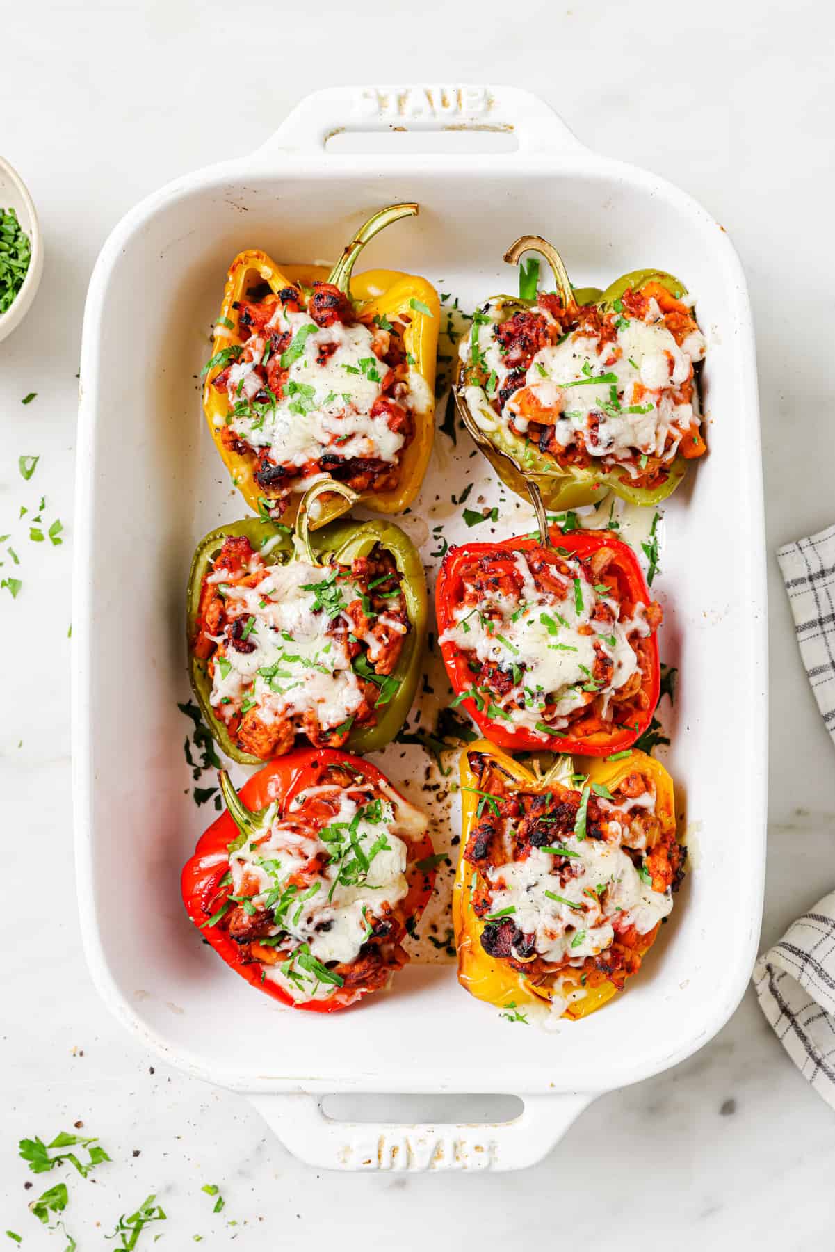 Baked stuffed peppers with cheese.