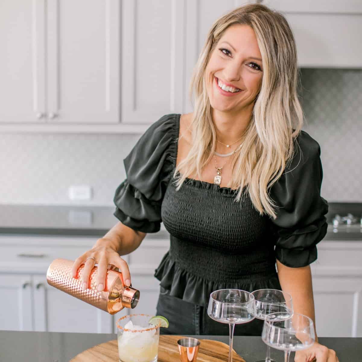 Photo of Krista making a cocktail