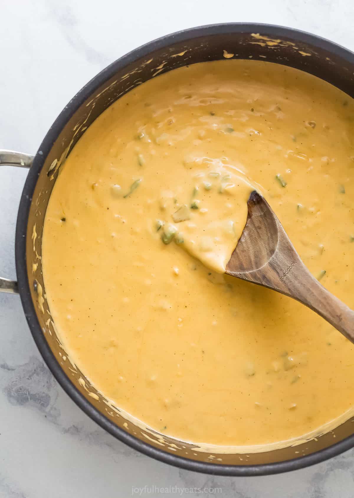 Melt cheese mixture in pan. 