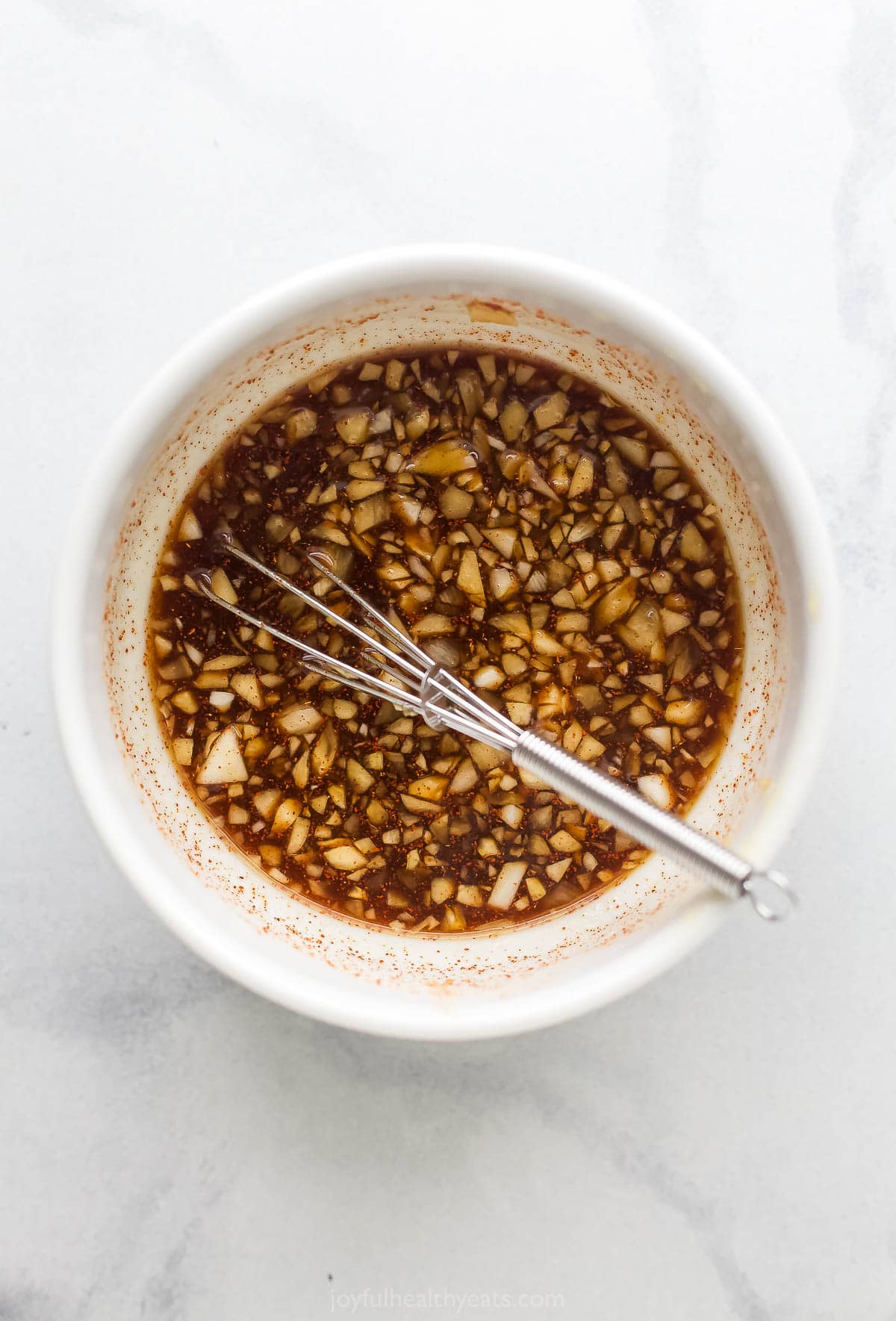 Whisked sauce in a bowl. 