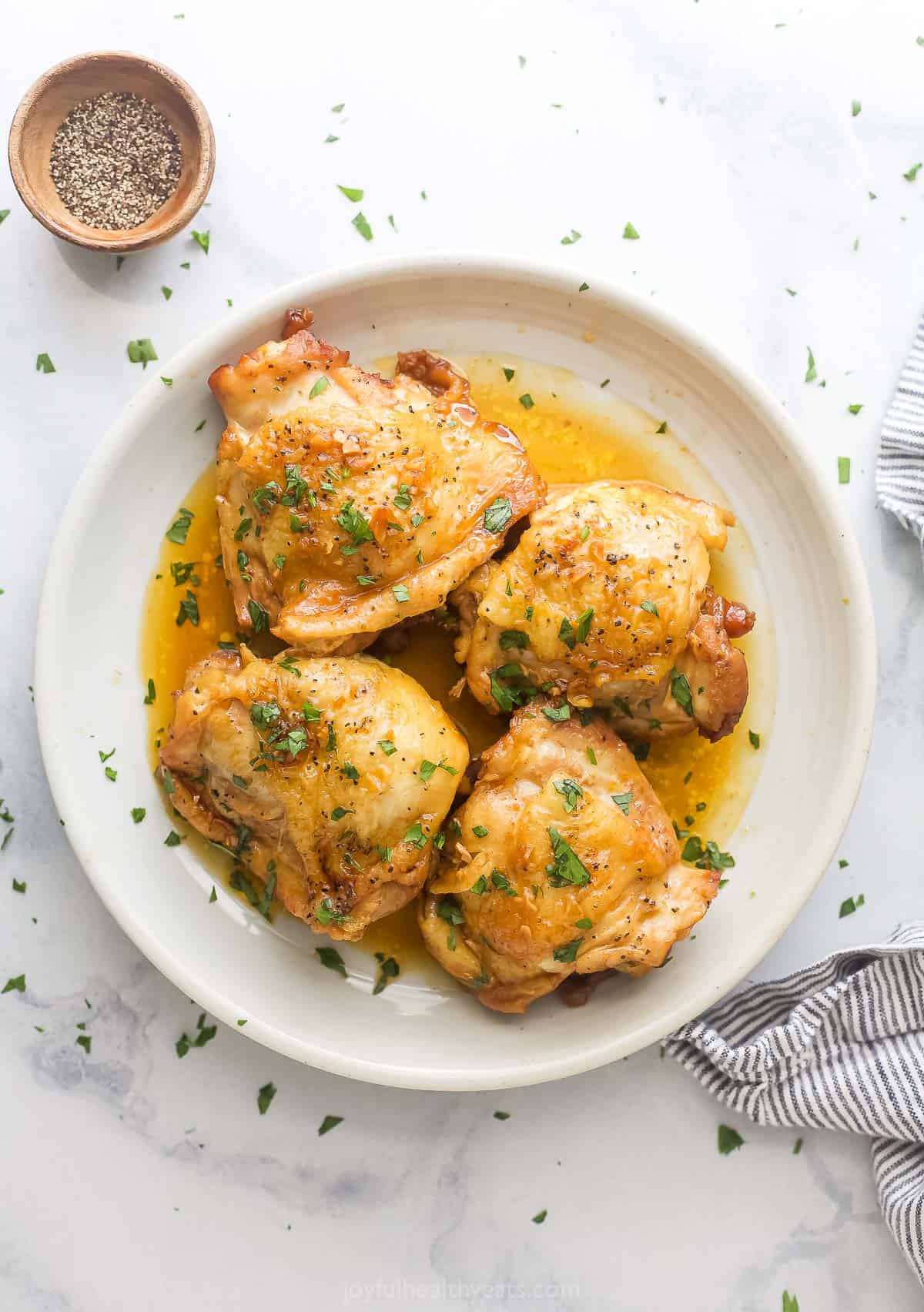 Instant pot chicken thighs on a plate. 
