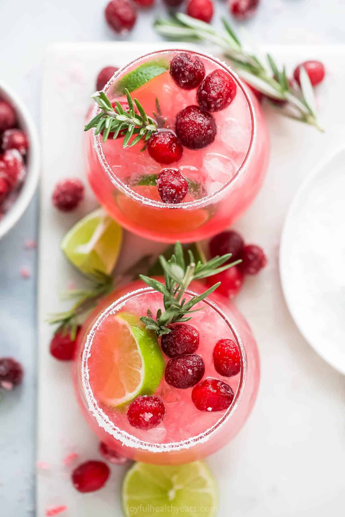 overhead photo of two mistletoe margaritas