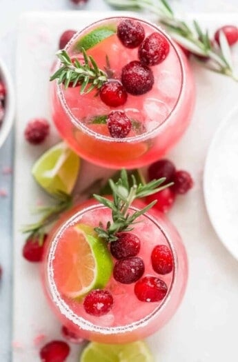 overhead photo of two mistletoe margaritas