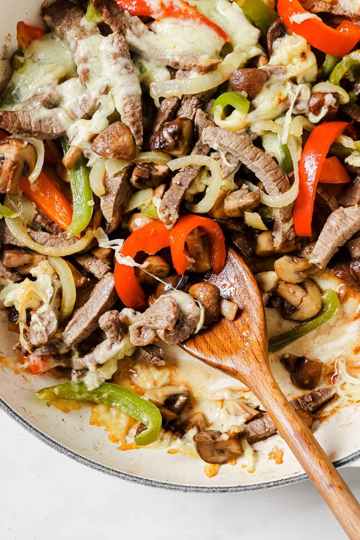 Close-up of philly cheesesteak skillet. 