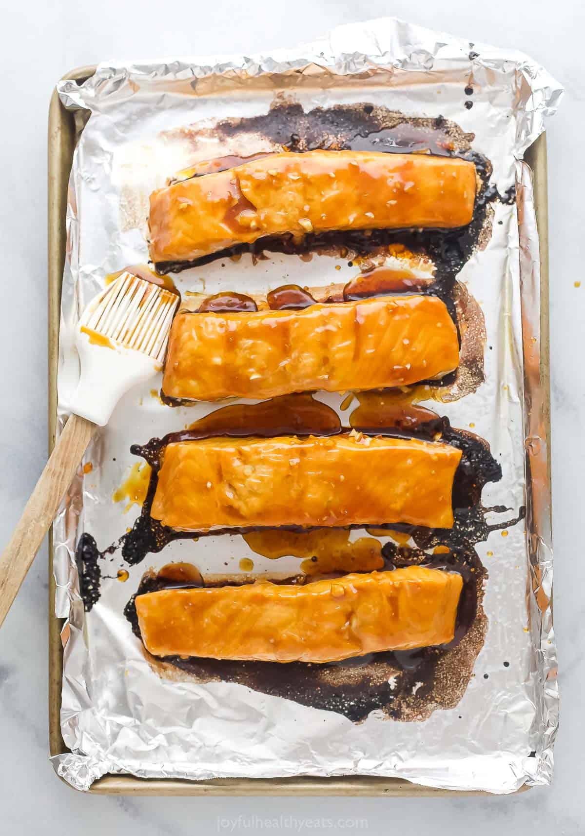 Baked and broiled filets on the baking sheet. 