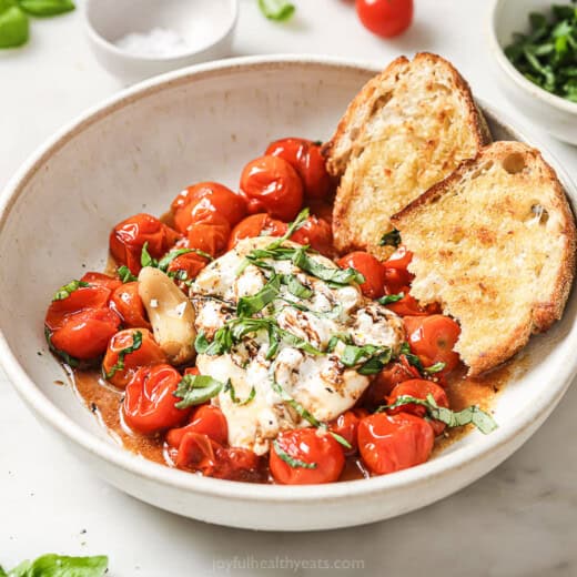 Landscape photo of burrata caprese.