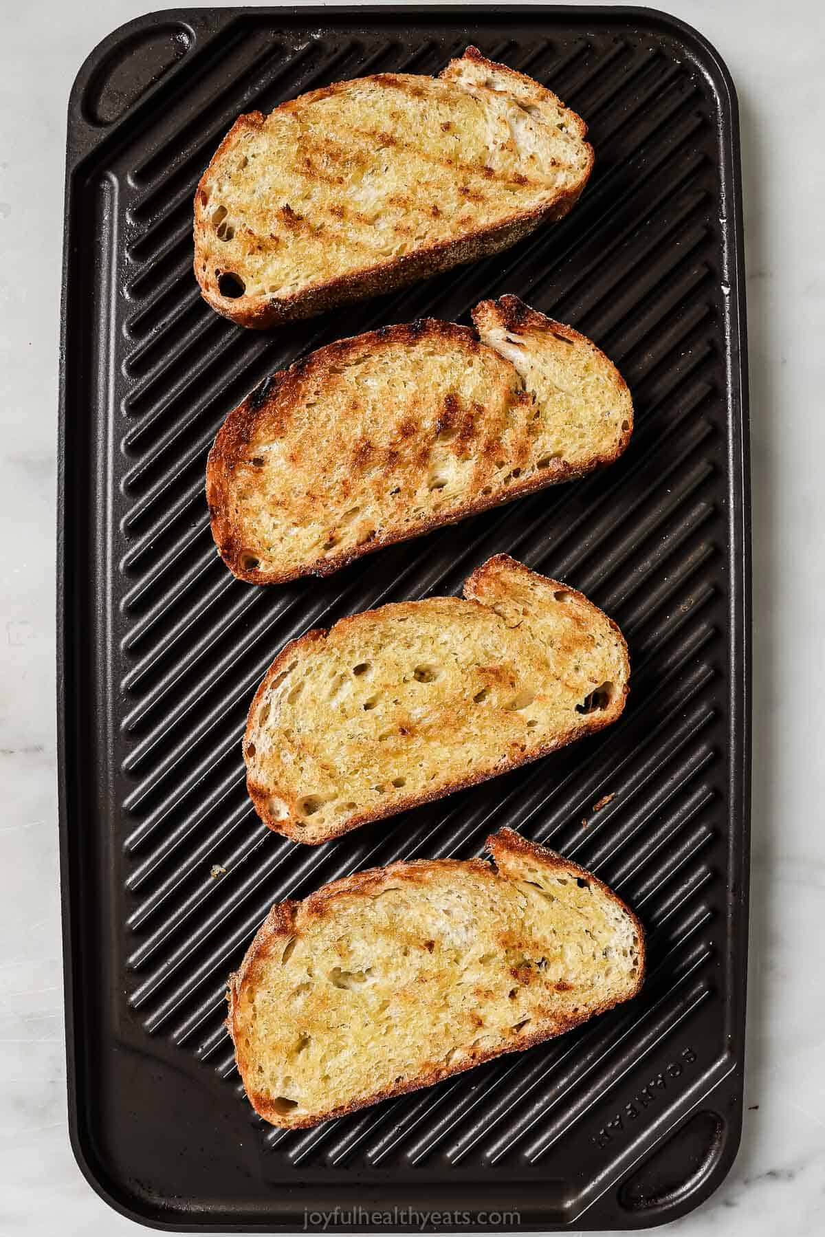 Toasted bread on a griddle.