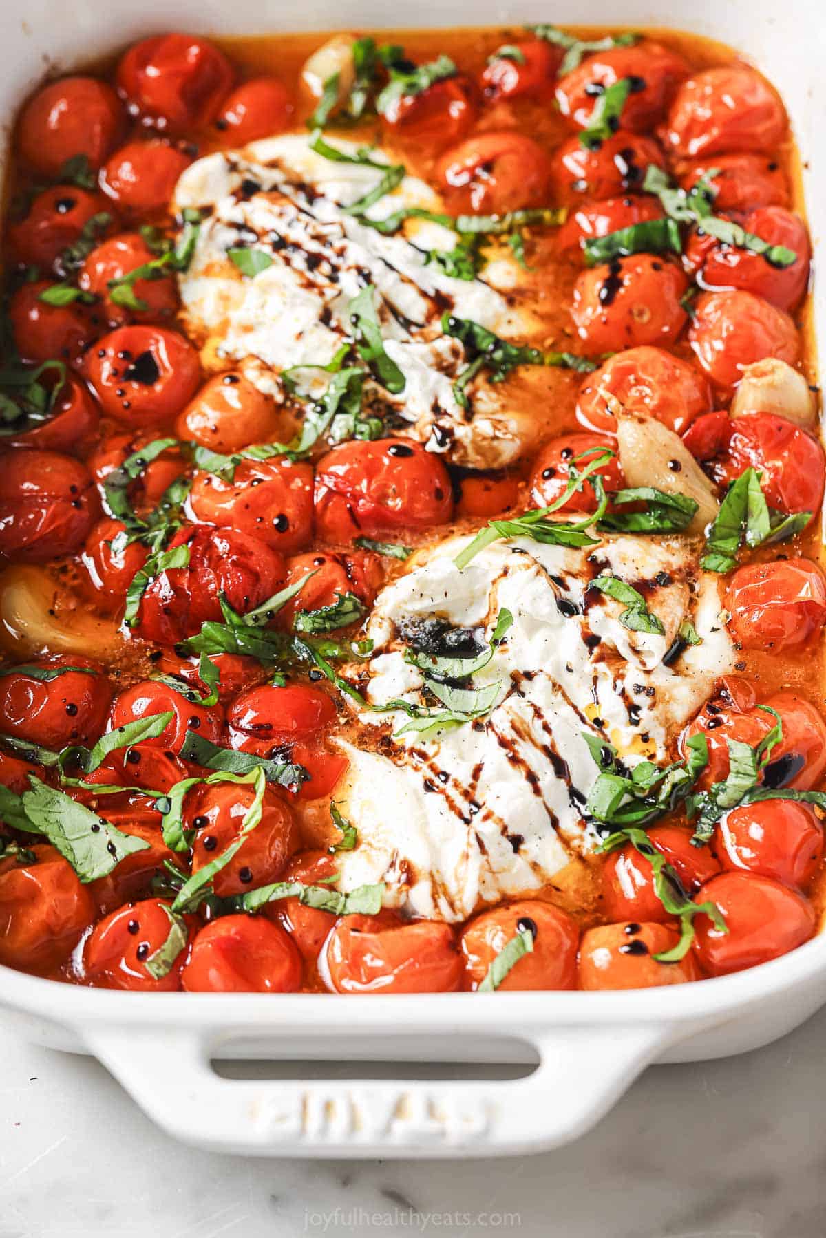Ready-to-serve Italia caprese with balsamic reduction.