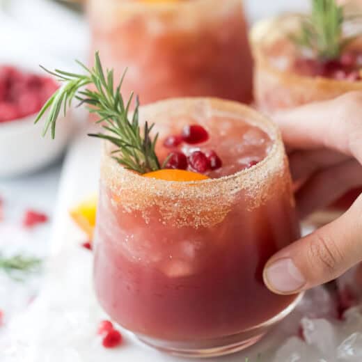Close-up photo of a Christmas margarita with a sweet cinnamon-sugar rim.