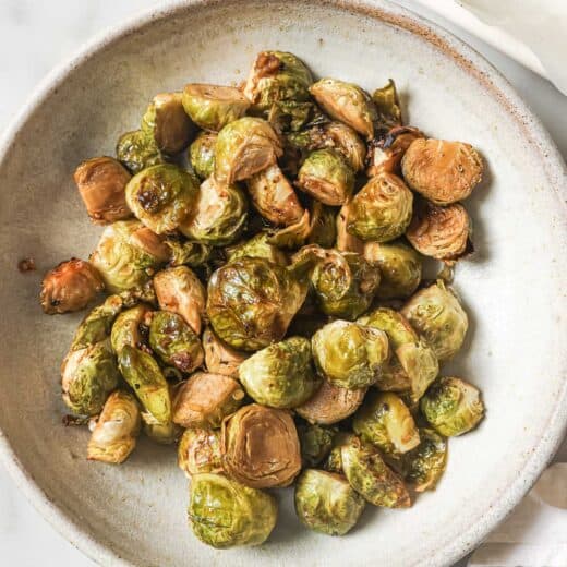 Overhead view of honey balsamic Brussels sprouts in bowl