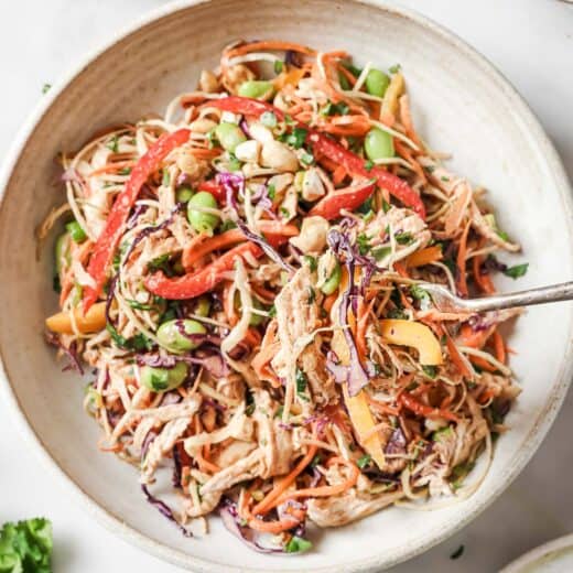 Overhead view of chopped Thai chicken salad in bowl