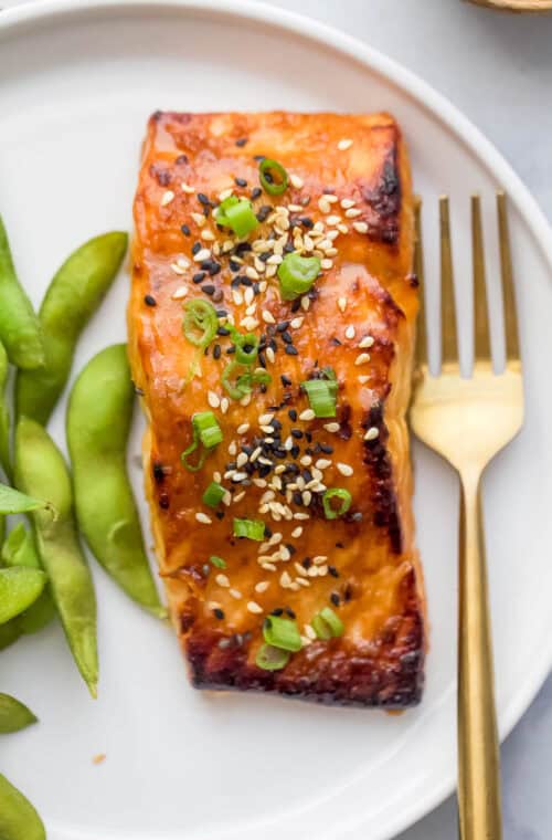 Miso salmon fillet on plate with fork