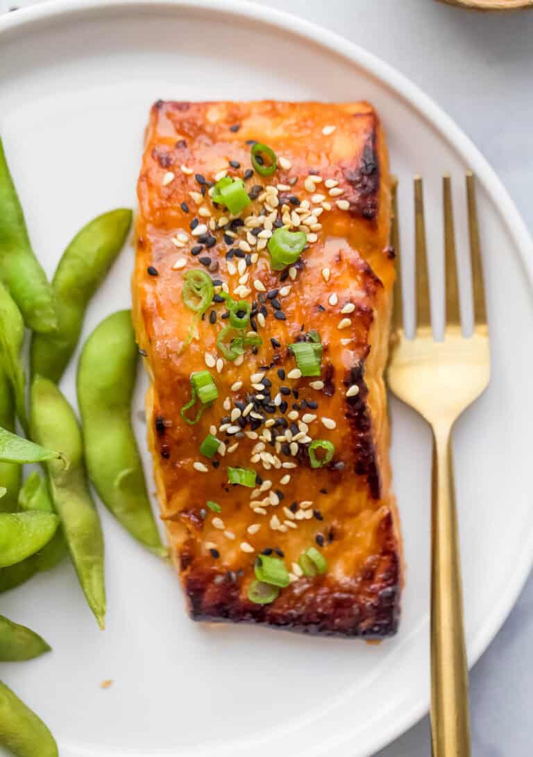 Miso salmon fillet on plate with fork