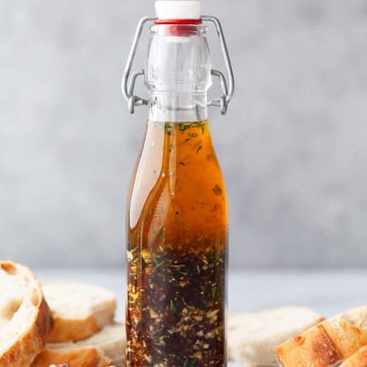 Bread dipping oil in glass bottle