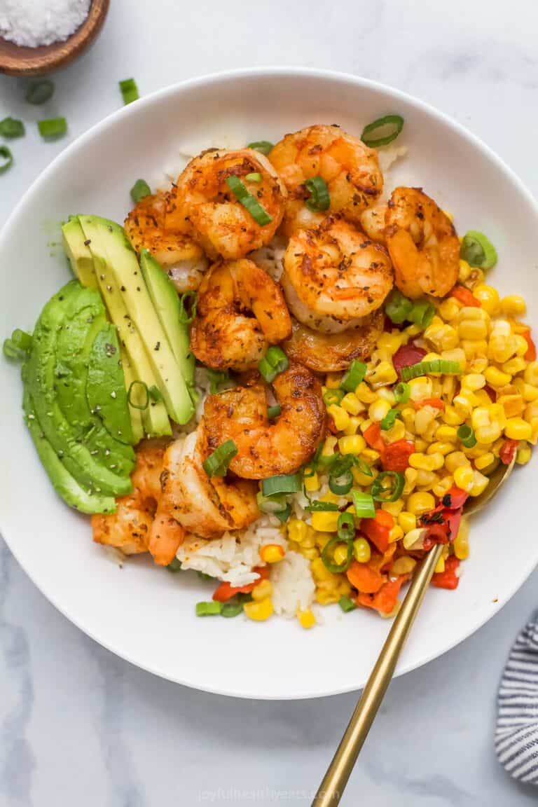 Overhead view of blackened shrimp bowl with spoon