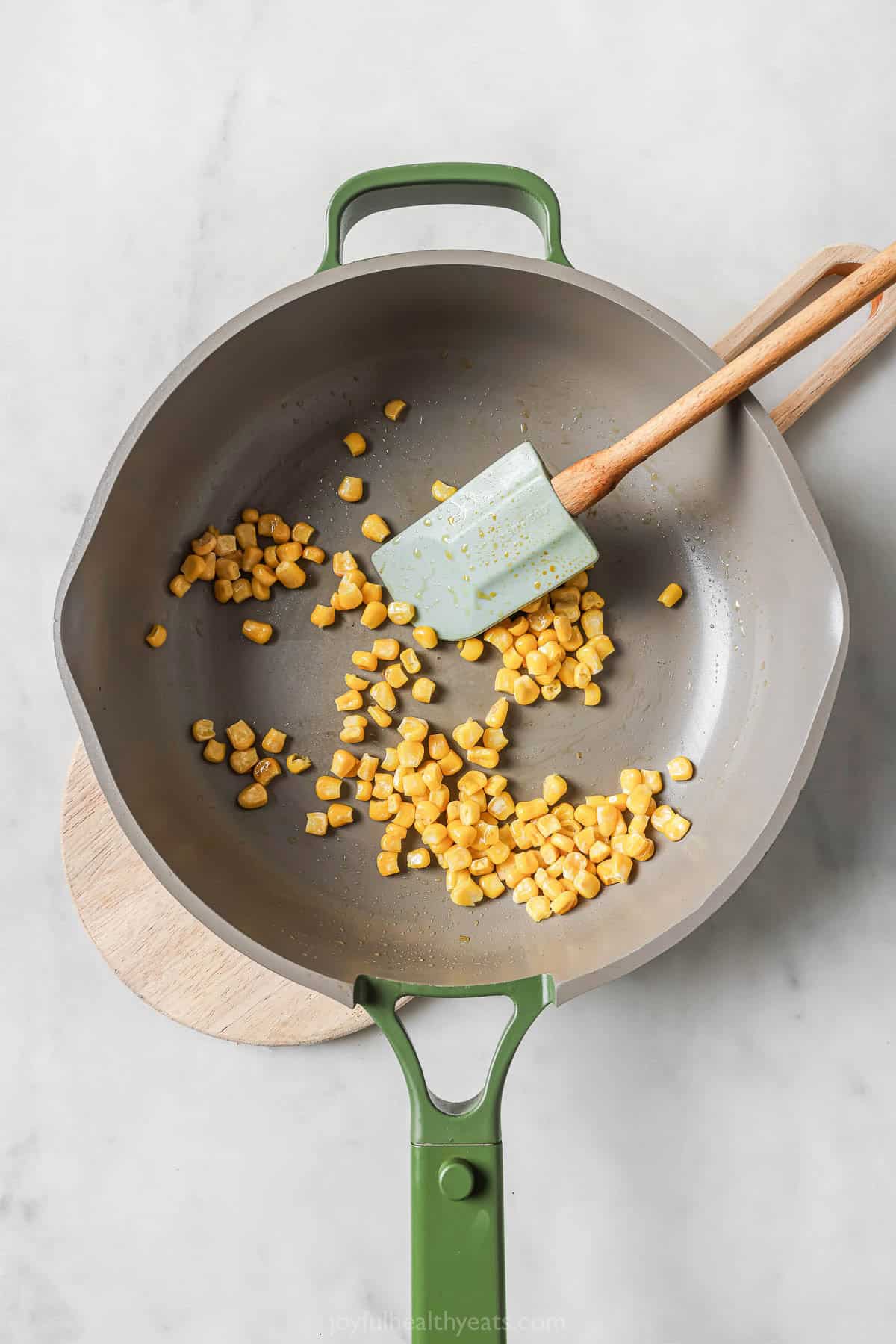 Sauteing corn in skillet