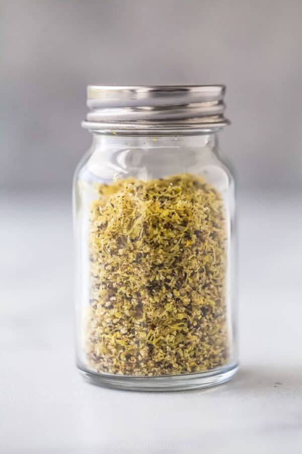 Homemade lemon pepper seasoning in jar with lid