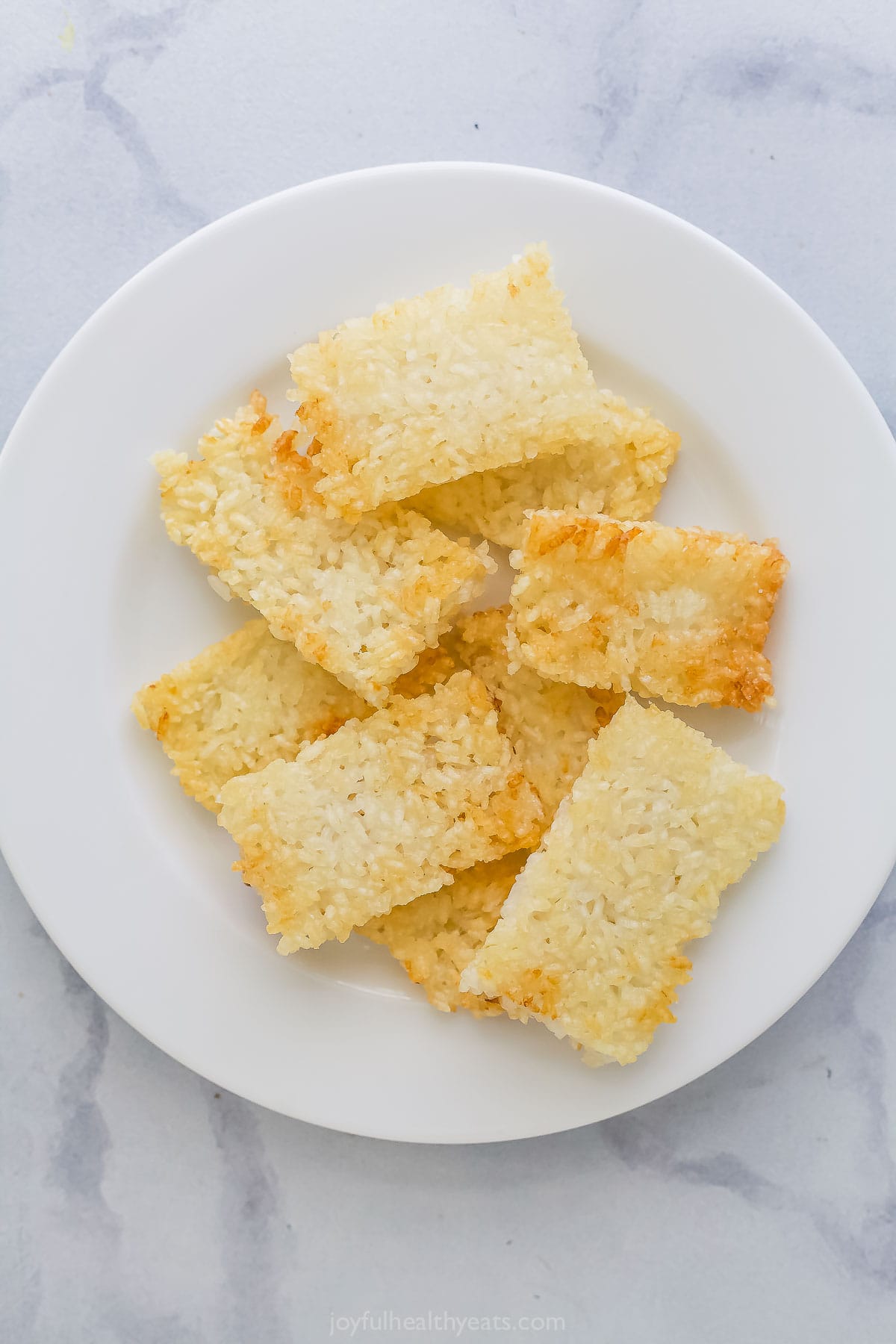 This Spicy Tuna Crispy Rice is a Nobu copycat that’s sure to impress! It’s easy to make, with ahi tuna topping crispy cubes of sushi rice. Crispy rice stacked on plate