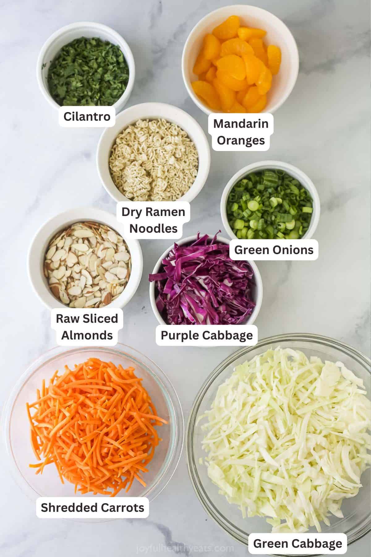 Crunchy, crisp, and sweet Ramen Noodle Salad is a classic! I’ve given it a more modern spin, but it still has that familiar flavor you love. Overhead view of ingredients for ramen noodle salad